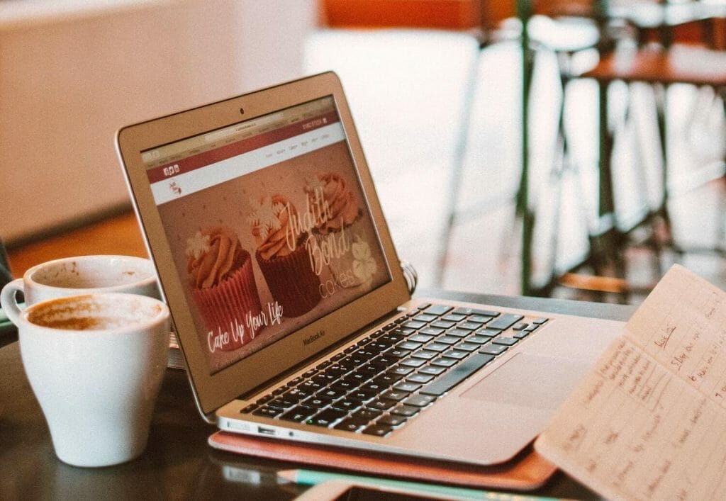 laptop on a table in a coffeeshop